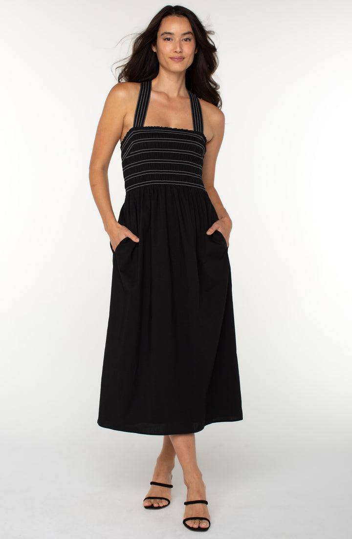 SLEEVELESS SMOCKED WOVEN MIDI DRESS - BLACK