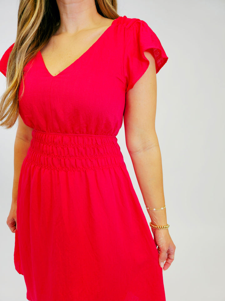 DOUBLE V-NECK FLUTTER SLEEVE SMOCKED SHORT DRESS - RED
