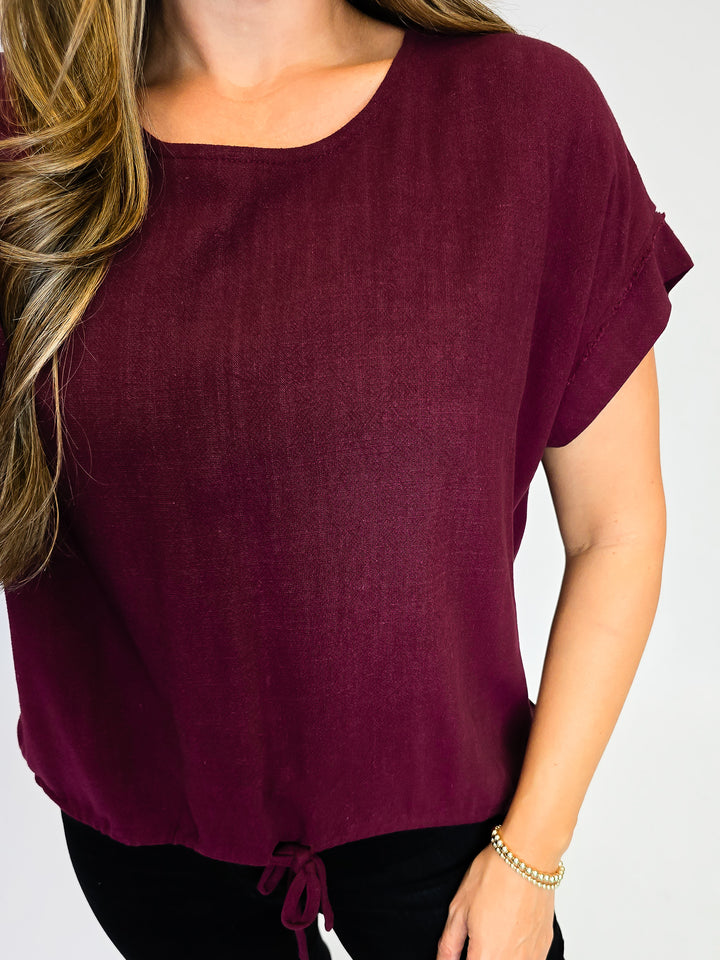 LINEN BLEND TOP W/ADJUSTABLE TIE HEM - MERLOT