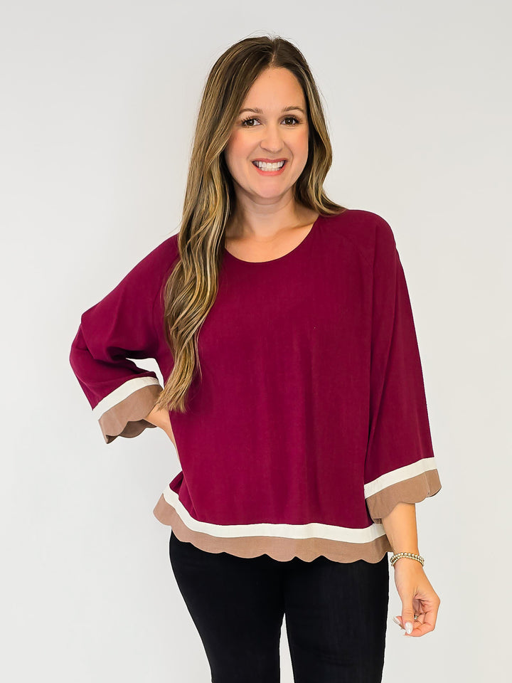 SCALLOPED HEM COLOR BLOCK TOP - MERLOT