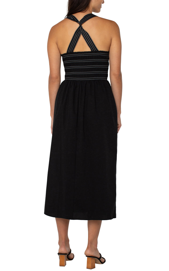 SLEEVELESS SMOCKED WOVEN MIDI DRESS - BLACK
