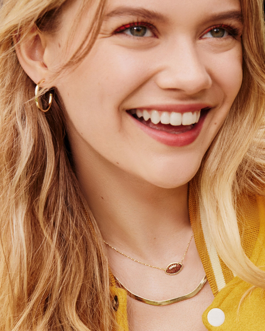 KENDRA SCOTT FOOTBALL SHORT PENDANT NECKLACE - GOLD ORANGE GOLD STONE