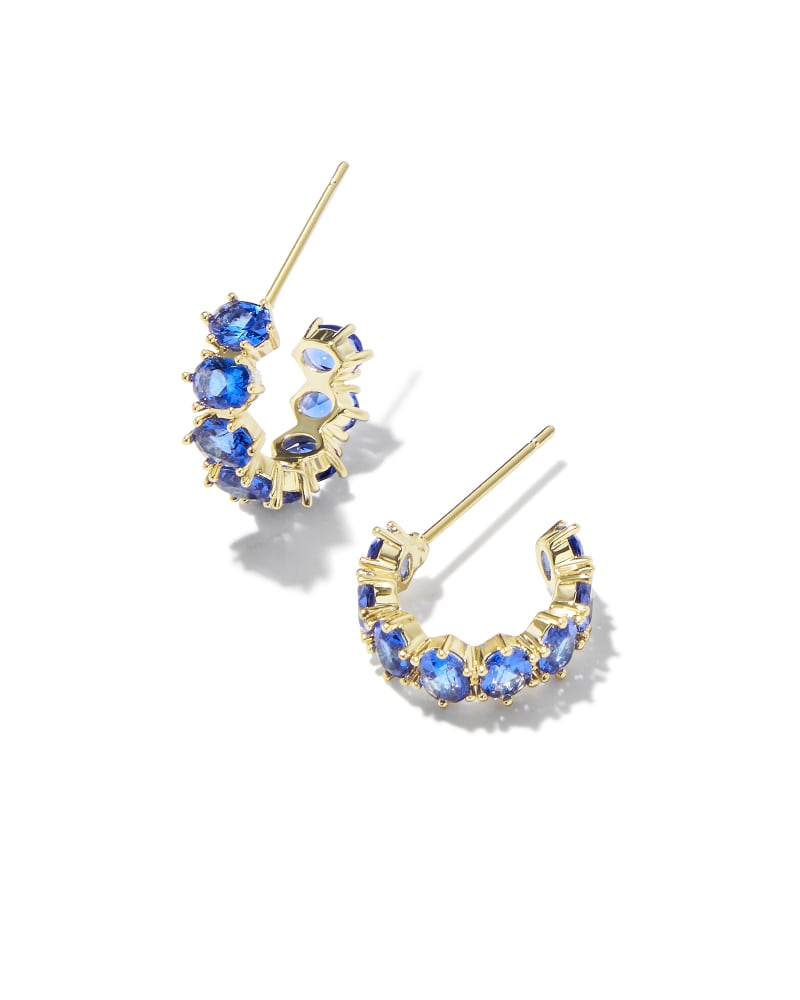 KENDRA SCOTT CAILIN CRYSTAL HUGGIE EARRINGS - GOLD BLUE CRYSTAL