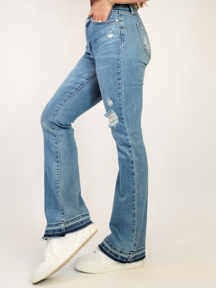 JUDY BLUE MIDRISE RELEASED HEM DISTRESSED BOOTCUT- MEDIUM - 32" INSEAM