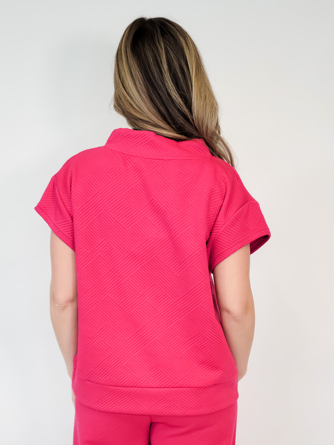 TEXTURED SHORT SLEEVE HALP ZIP TOP - BARBIE PINK