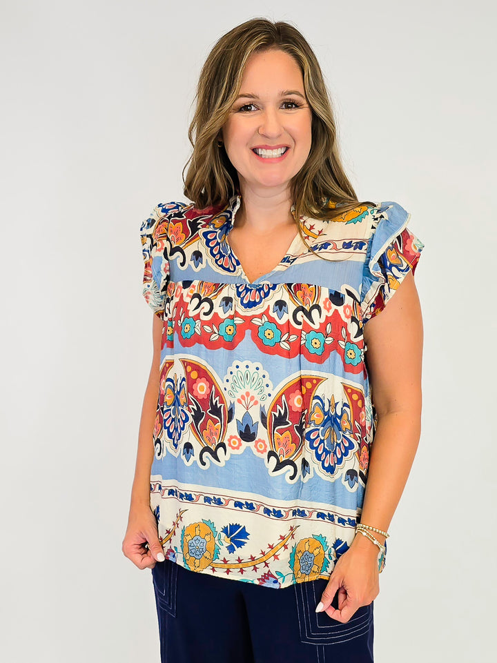 BORDER PRINT TOP WITH SHORT RUFFLE SLEEVES - BLUE MIX