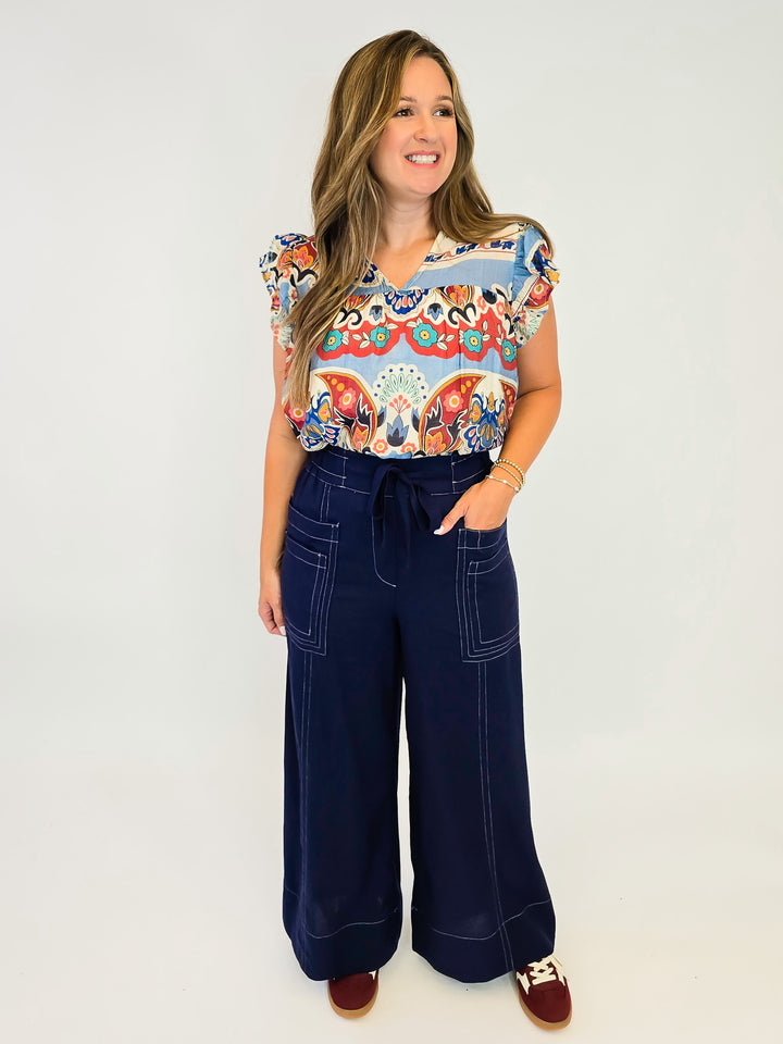 BORDER PRINT TOP WITH SHORT RUFFLE SLEEVES - BLUE MIX
