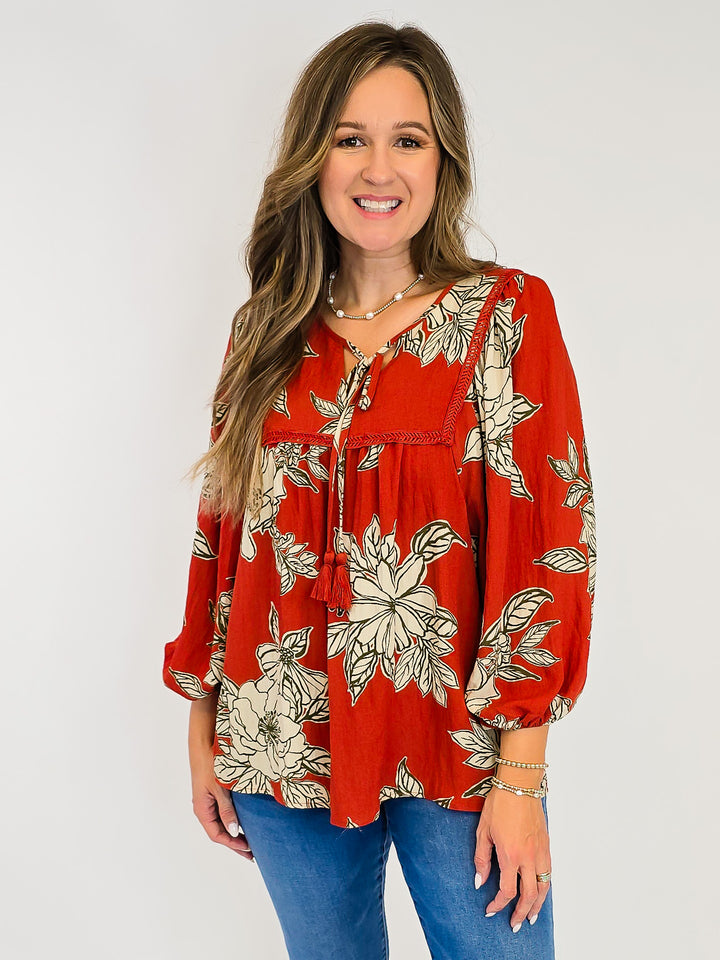 LARGE FLORAL WOVEN TOP W/TASSELS - RUST
