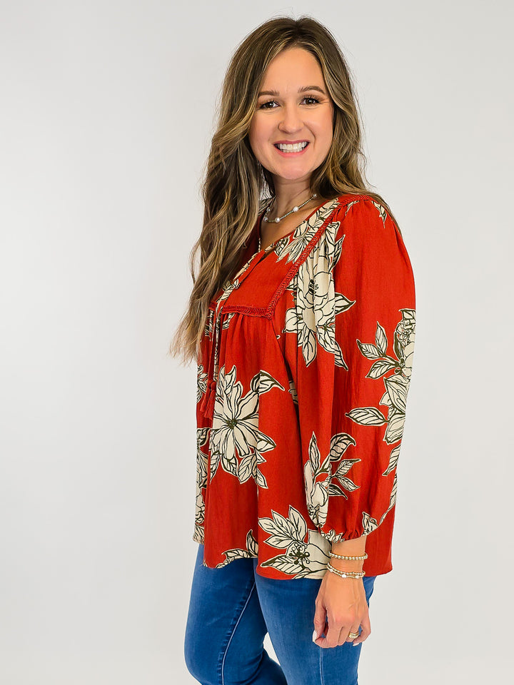 LARGE FLORAL WOVEN TOP W/TASSELS - RUST