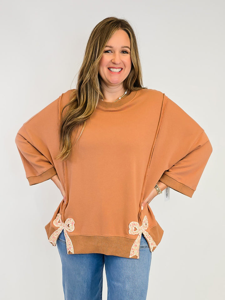 BOW PATCH BOTTOM HEM WASHED TERRY PULLOVER - CAMEL