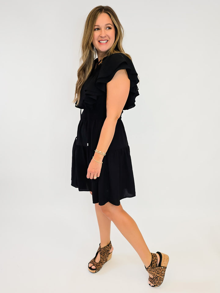 FLUTTER SLEEVE TIERED SHORT DRESS W/SMOCKED WAIST - BLACK