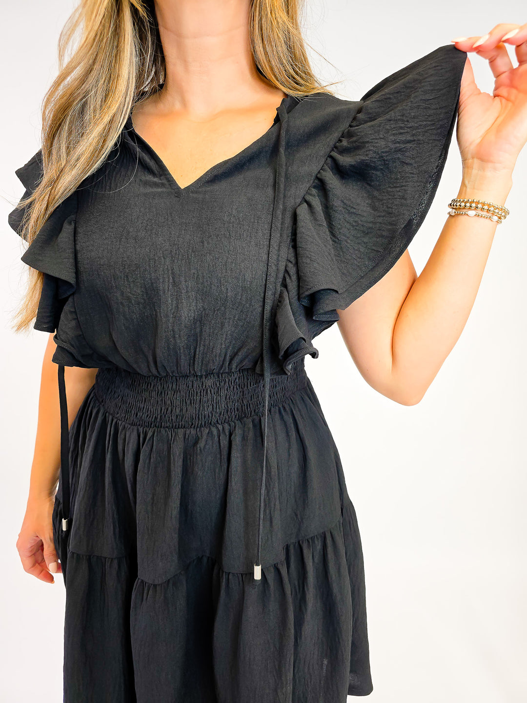 FLUTTER SLEEVE TIERED SHORT DRESS W/SMOCKED WAIST - BLACK