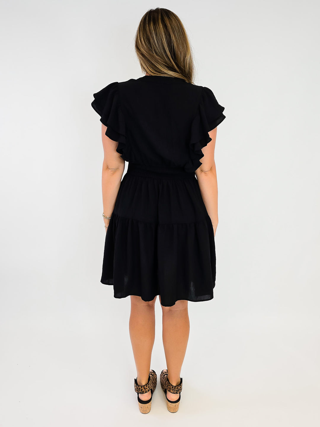 FLUTTER SLEEVE TIERED SHORT DRESS W/SMOCKED WAIST - BLACK