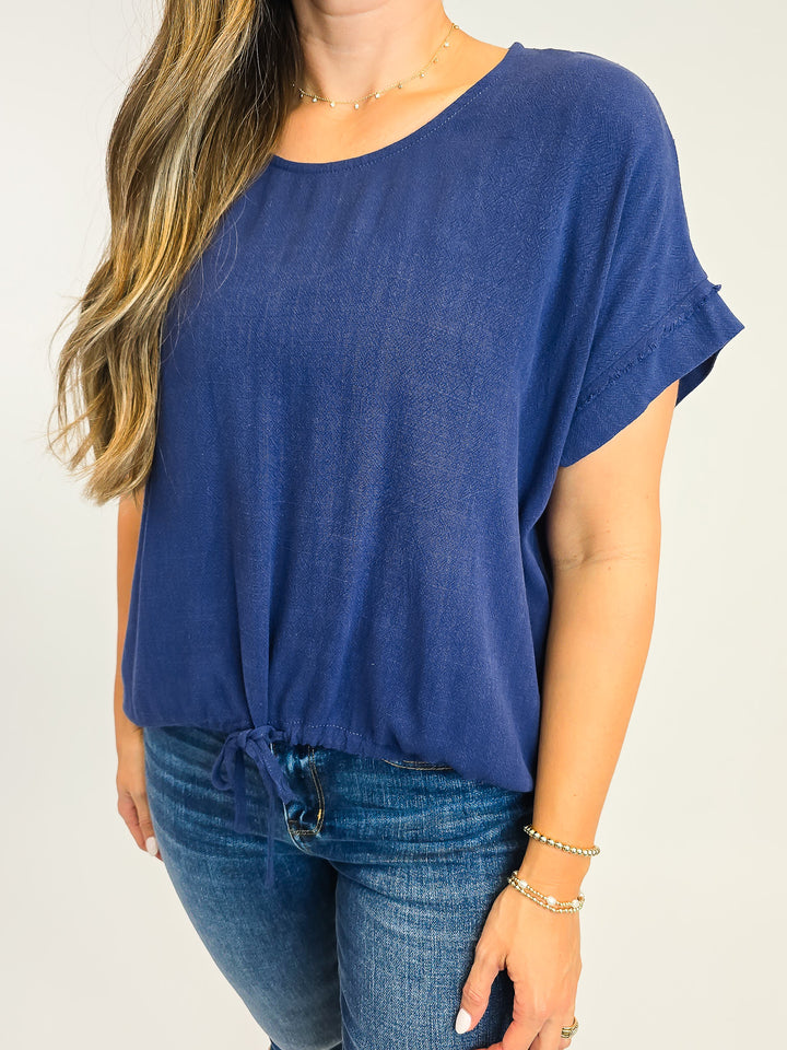 LINEN BLEND TOP W/ADJUSTABLE TIE HEM - NAVY