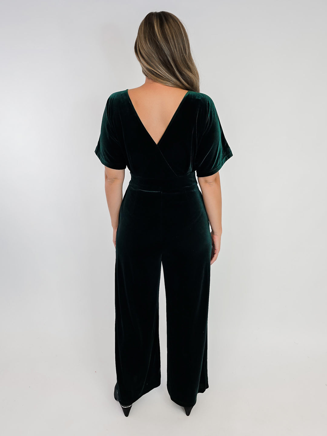 SURPLICE NECK VELVET JUMPSUIT - HUNTER GREEN