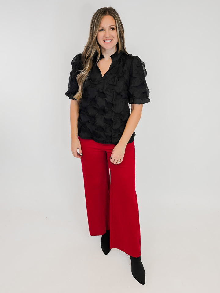 SATIN RUFFLED DETAIL DOTTED TEXTURED TOP - BLACK