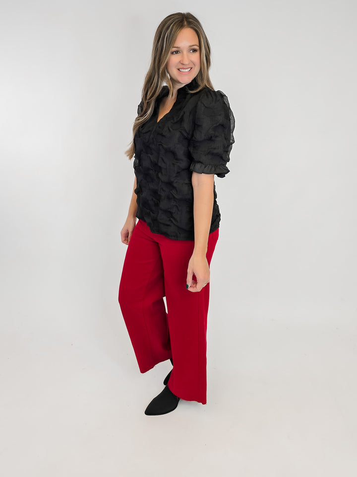 SATIN RUFFLED DETAIL DOTTED TEXTURED TOP - BLACK