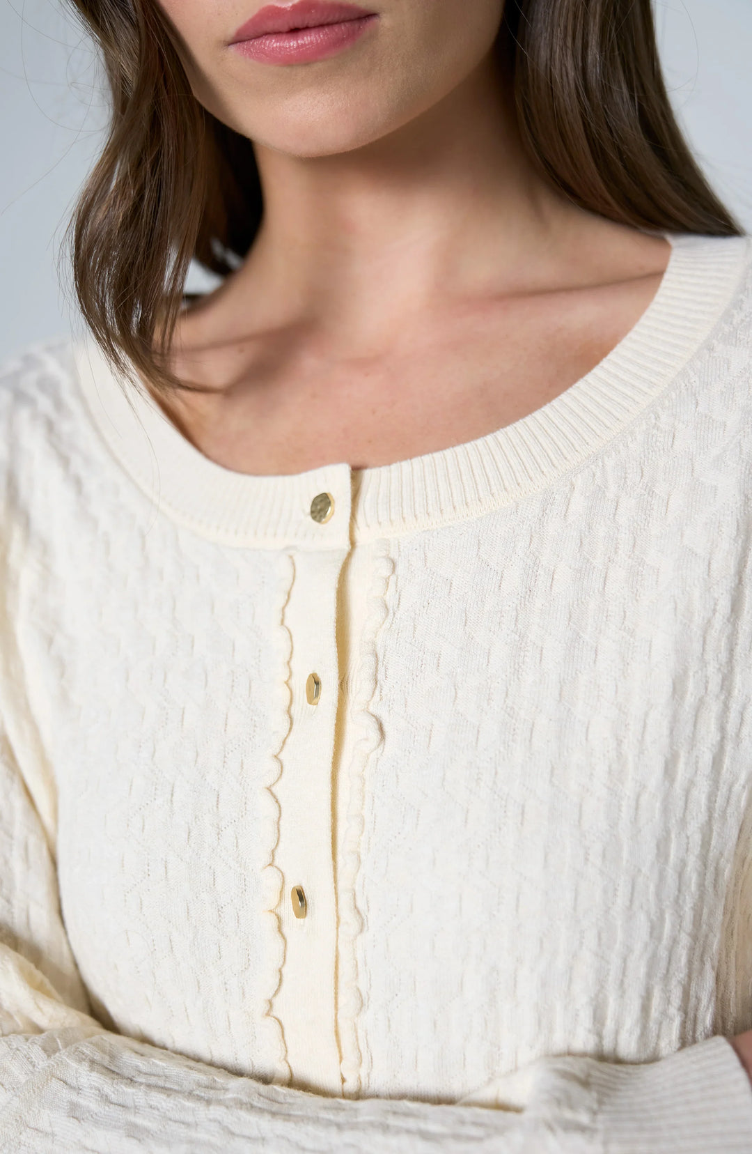 LONG SLEEVE BUTTON FRONT CARDIGAN SWEATER W/RUFFLES - CREAM