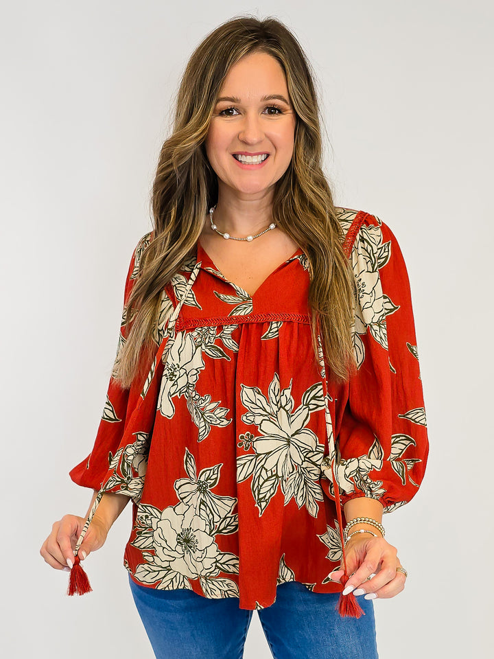 LARGE FLORAL WOVEN TOP W/TASSELS - RUST