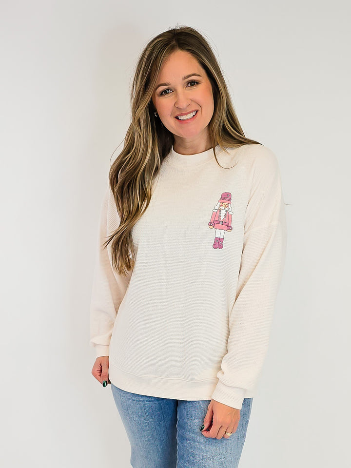 NUTCRACKER PINK COOKIE GRAPHIC CLOUDY KNIT TOP - CREAM