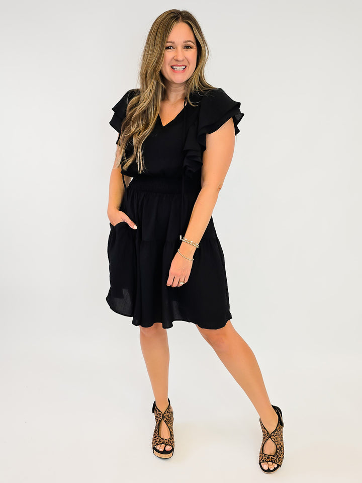 FLUTTER SLEEVE TIERED SHORT DRESS W/SMOCKED WAIST - BLACK