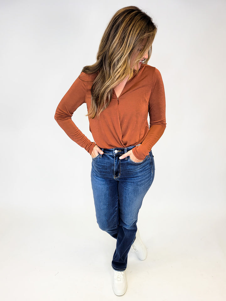CROSSOVER STRETCHY LONG SLEEVE BODY SUIT - RUST