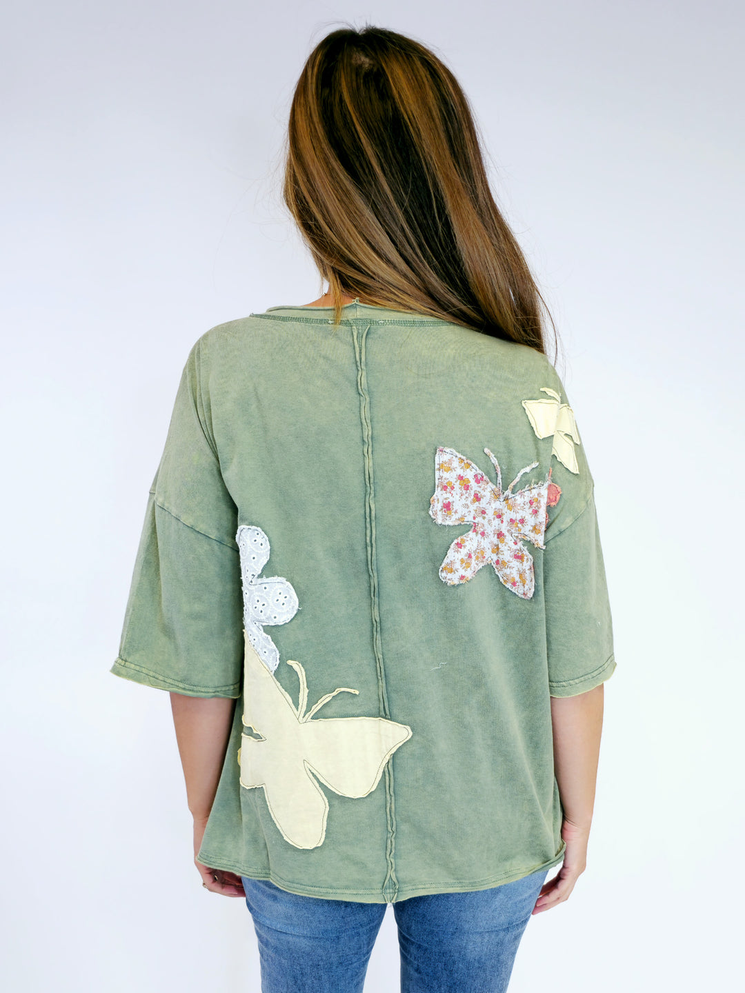 WASHED FLOWER AND BUTTERFLY TOP - GREEN