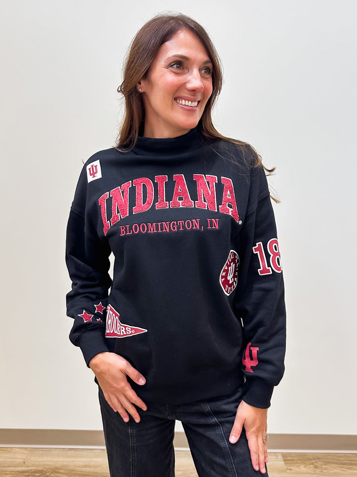 IU ALLOVER SCATTER FUNNEL NECK TOP - BLACK