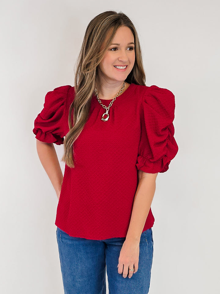 RUCHED PUFF SLEEVE TEXTURED KNIT TOP - RED