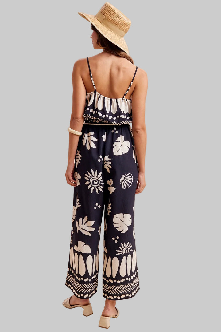 TROPICAL PRINT SCOOP NECK JUMPSUIT - BLACK
