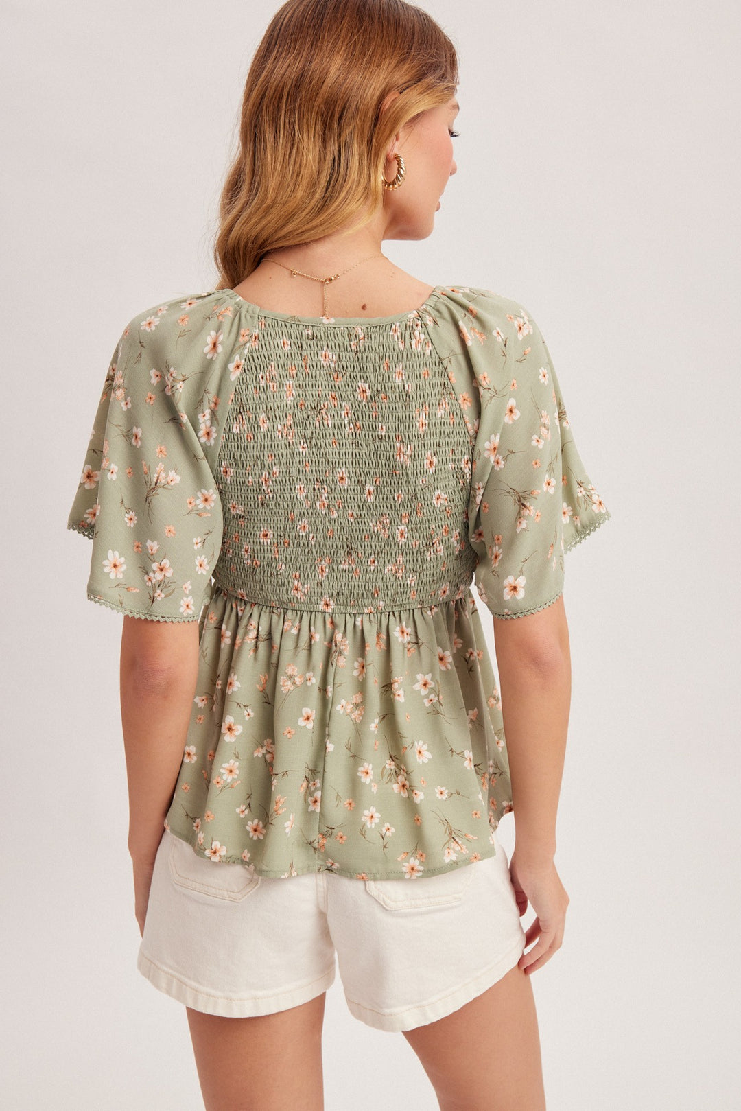V-NECK FLUTTER SLEEVE SMOCKED PEPLUM TOP - SAGE