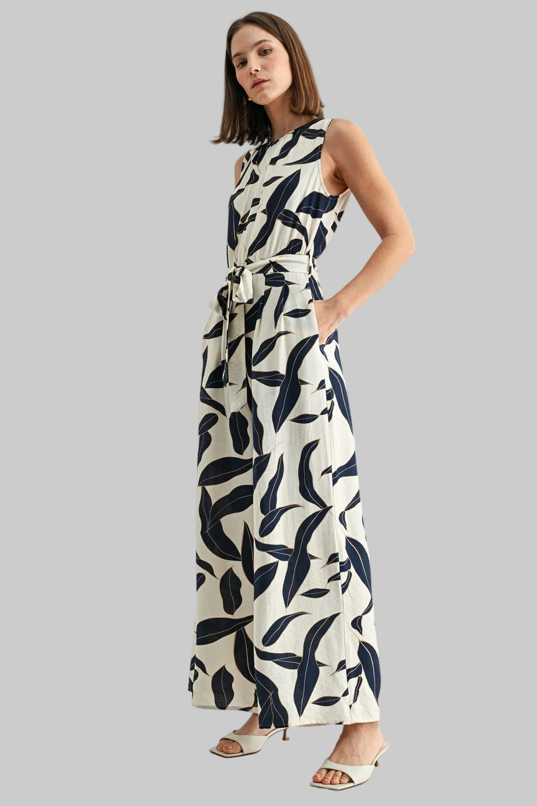 SLEEVELESS LEAF PRINT TIE WAIST JUMPSUIT - NAVY