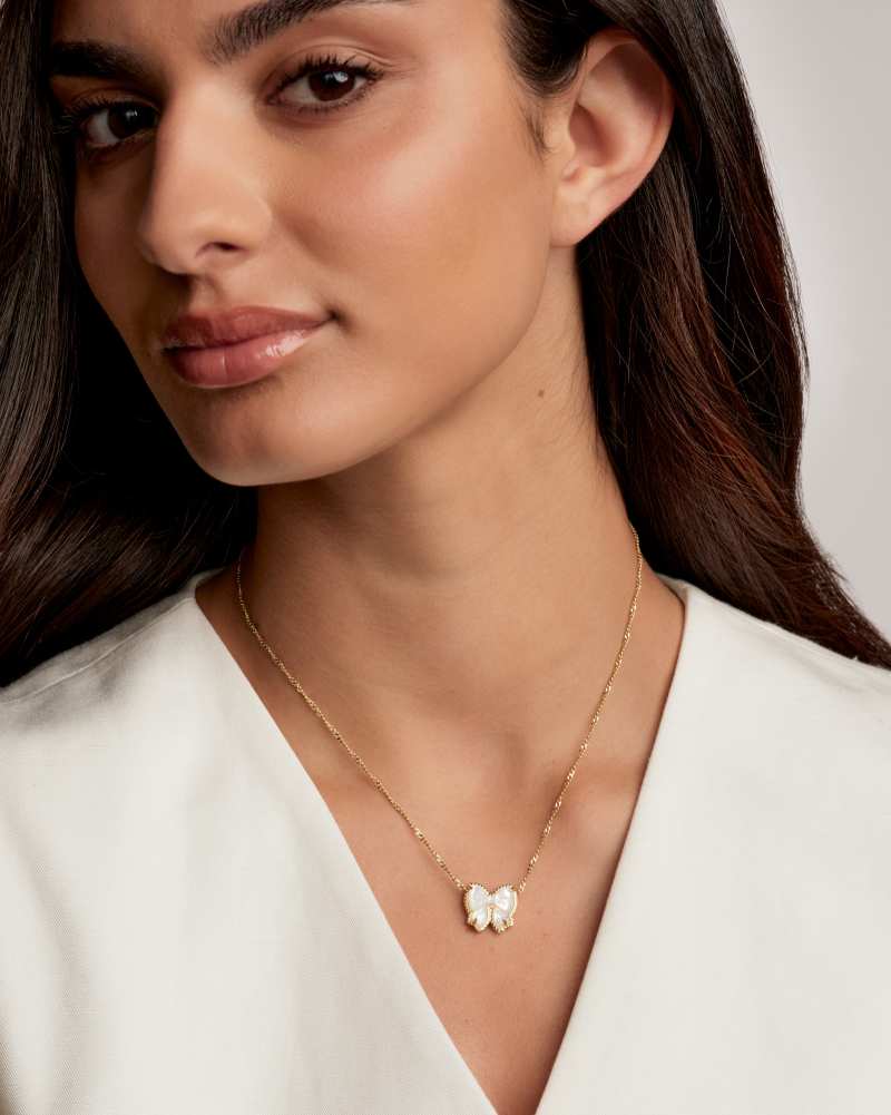 KENDRA SCOTT HALEY BOW SHORT PENDANT NECKLACE - GOLD IVORY MOP