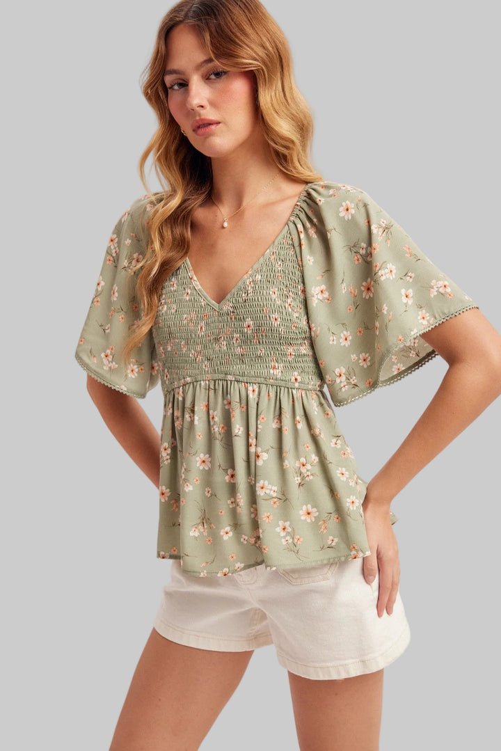 V-NECK FLUTTER SLEEVE SMOCKED PEPLUM TOP - SAGE