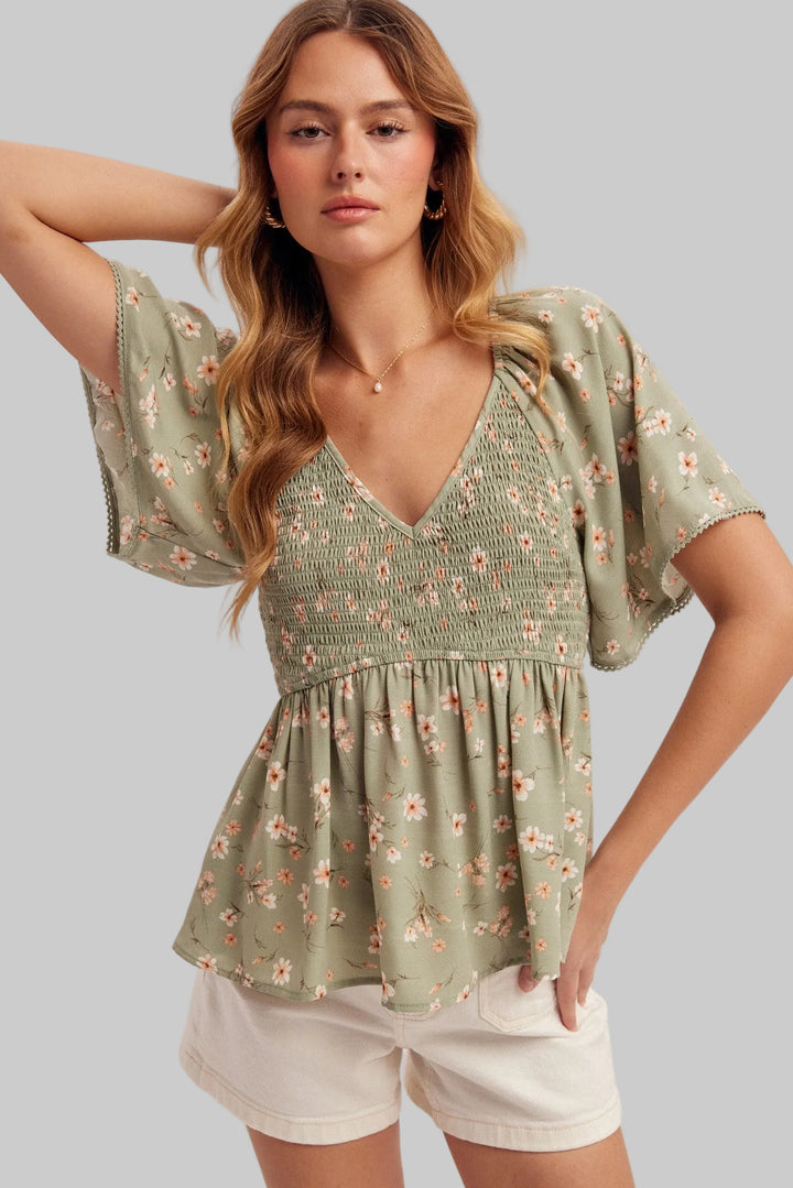 V-NECK FLUTTER SLEEVE SMOCKED PEPLUM TOP - SAGE