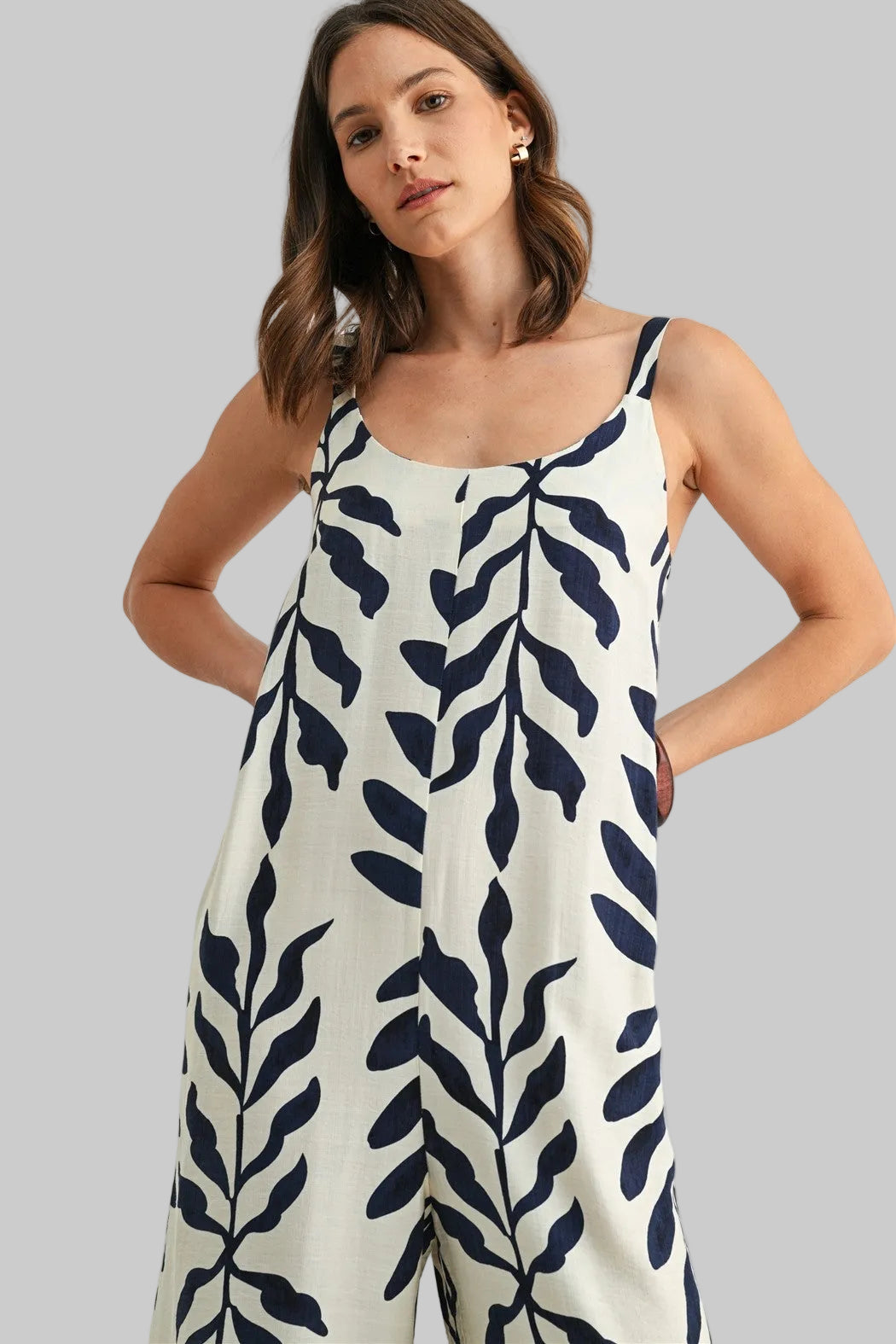 SLEEVELESS LEAF PRINT JUMPSUIT - IVORY/NAVY