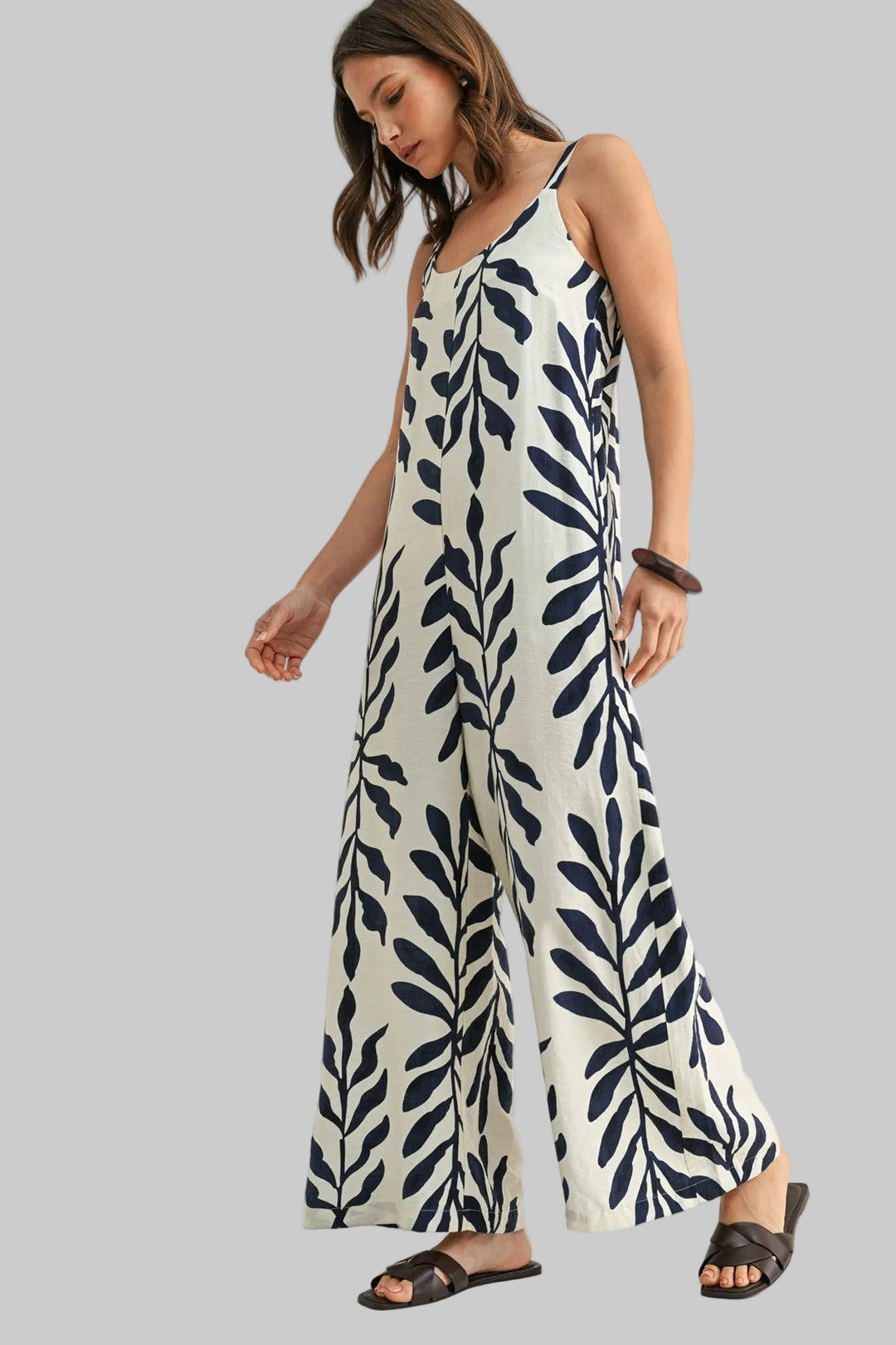 SLEEVELESS LEAF PRINT JUMPSUIT - IVORY/NAVY