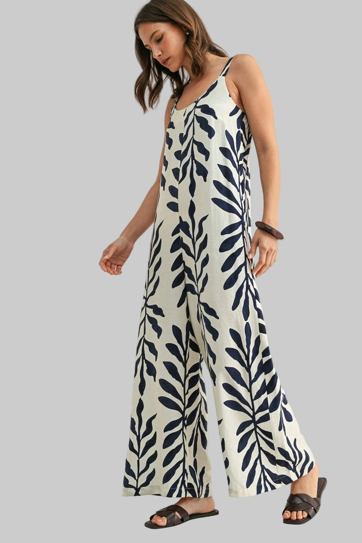 SLEEVELESS LEAF PRINT JUMPSUIT - IVORY/NAVY